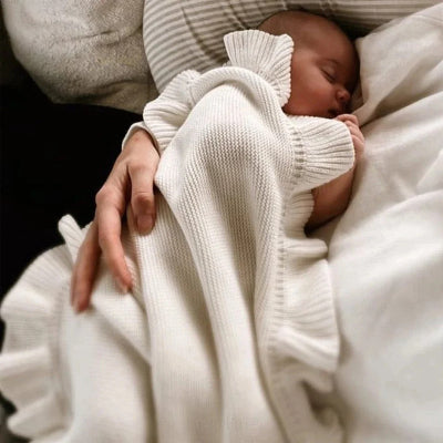 couverture bebe sommeil bras maman
