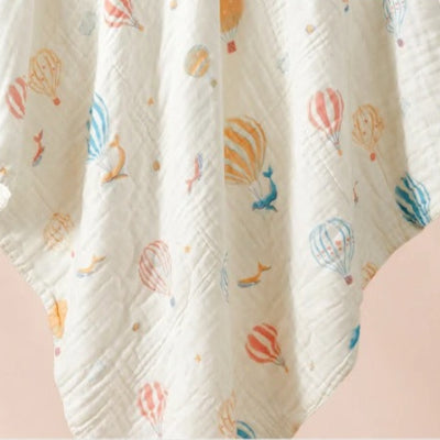 lange bebe quatre couches mongolfiere