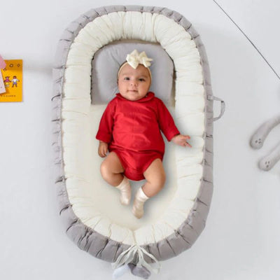 reducteur de lit bebe calme