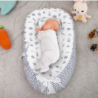 reducteur de lit bebe sommeil
