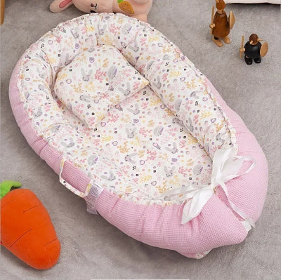 reducteur de lit lapin rose