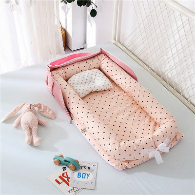reducteur de lit pois rose