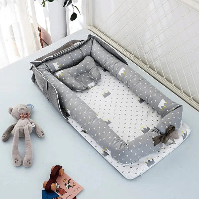 reducteur de lit portable couronnes
