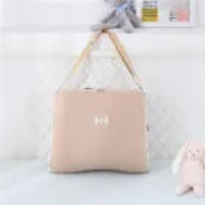 reducteur de lit portable sac beige