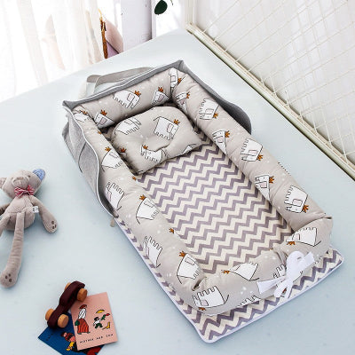 reducteur de lit pour bebe gris