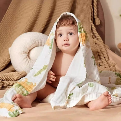 lange bebe assis couvert