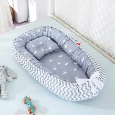reducteur de lit couronnes gris
