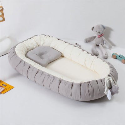 reducteur de lit douillet